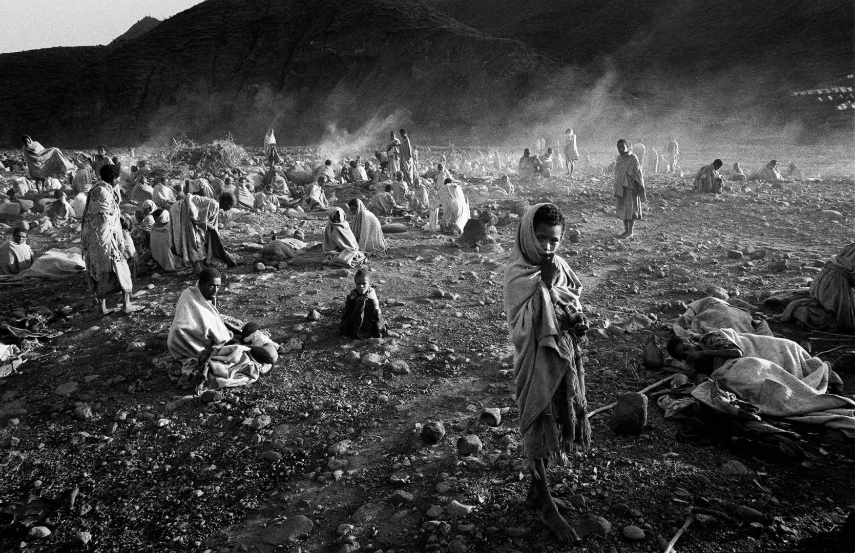 During the catastrophic Ethiopian famine of the 1980s, families in need of food and water walked long distances to reach World Vision&rsquo;s feeding camp.