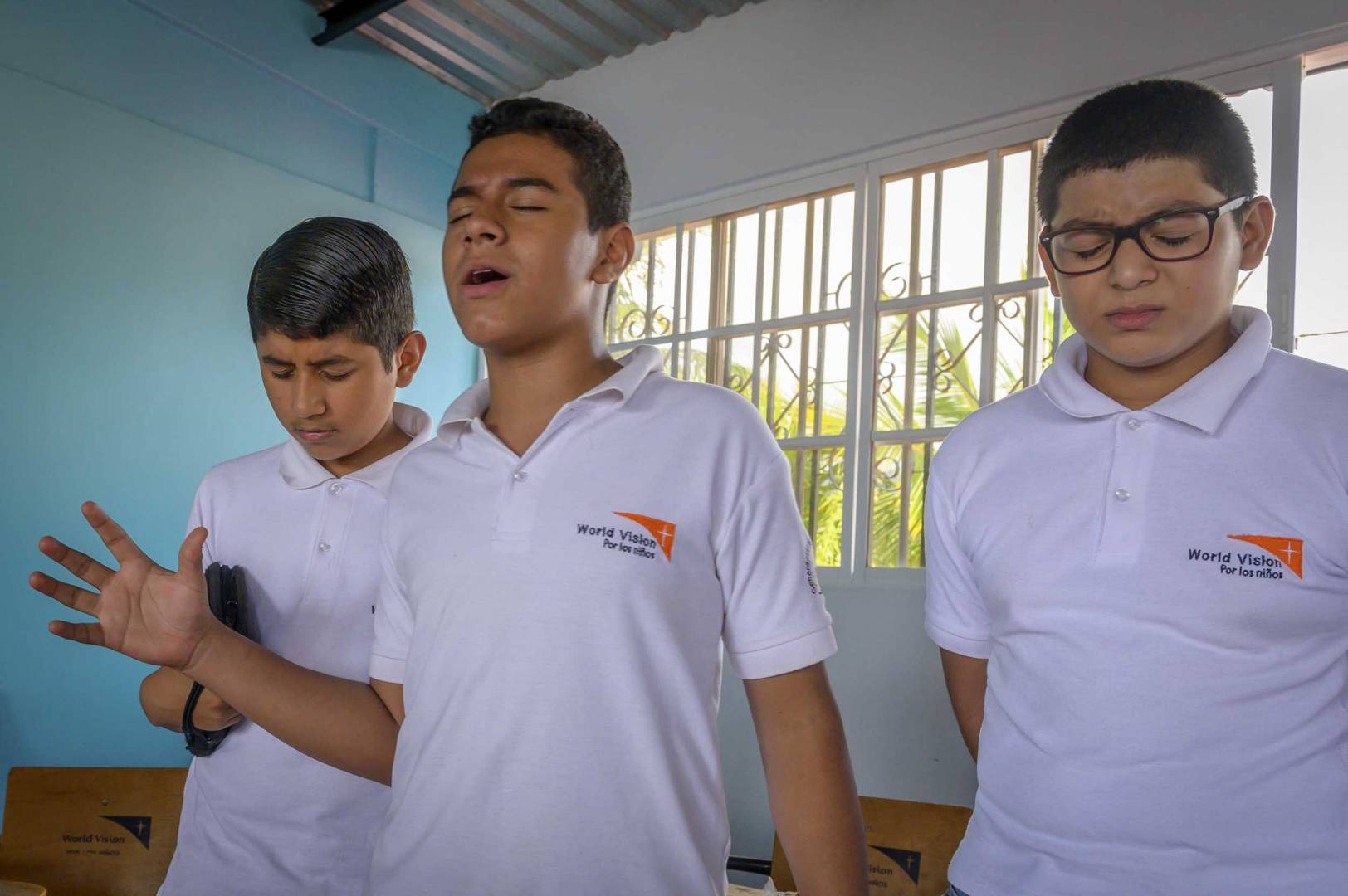 Honduras Hope Christian Discipleship In Tegucigalpa, Honduras, a group of preteens and teenagers gather faithfully to pray for their community, nation, and each other.