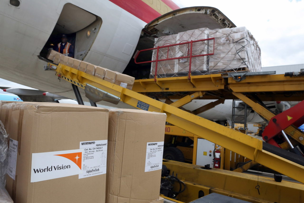 Boxed medical supplies were being loaded onto a plane at John F. Kennedy Airport, destined for West Africa, during the 2014 Ebola outbreak.
