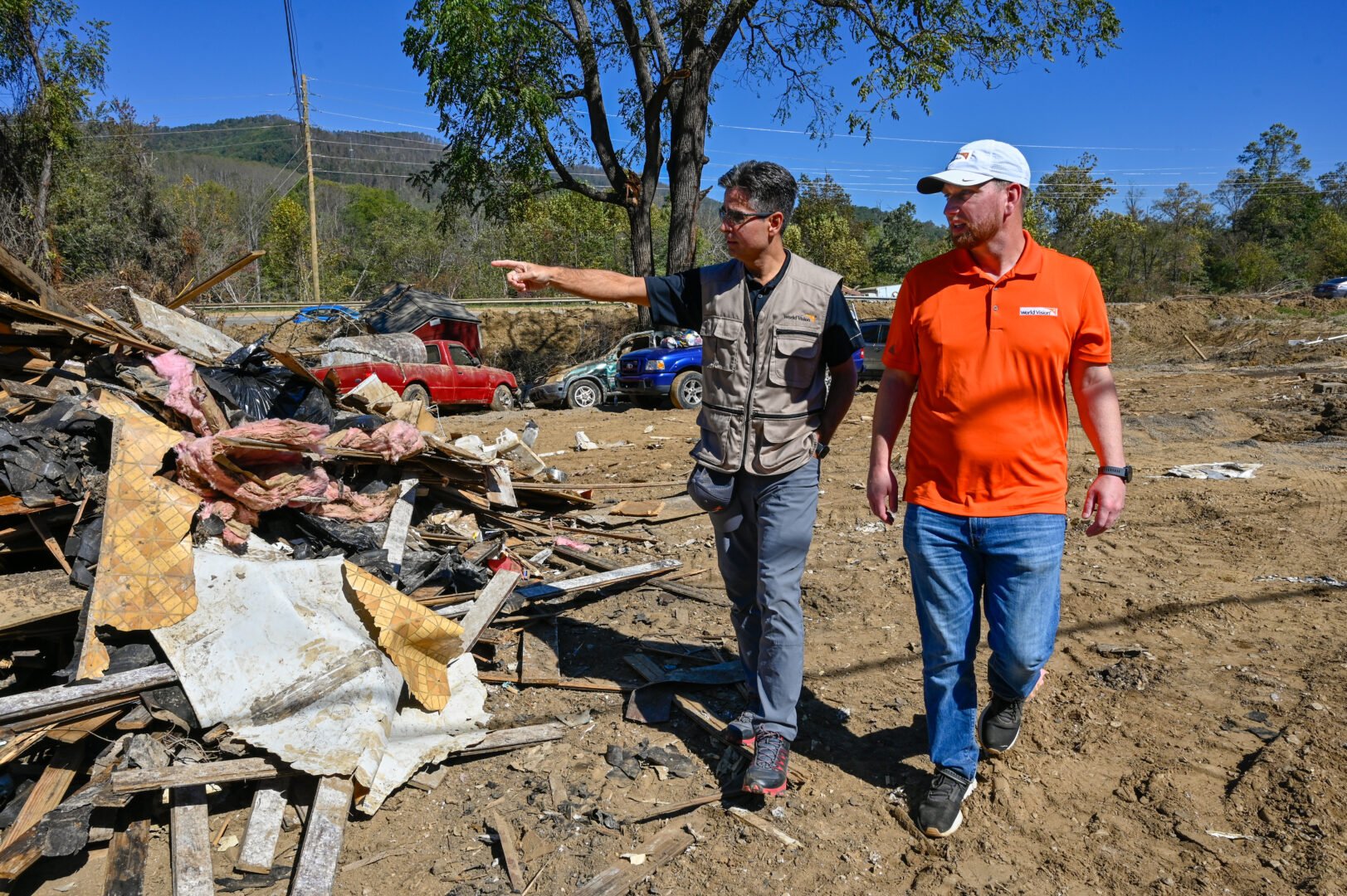 edgar walking and observing a disaster relief site