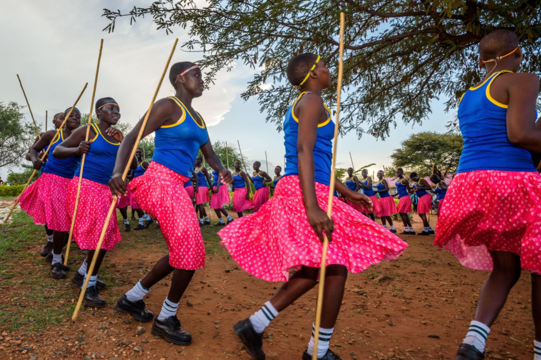 Hope Child Protection Kenya ELO Students at St. Elizabeth Girls Secondary School celebrate their culture with a traditional Pokot dance. A number of the students are there on scholarship, having fled home to escape child marriage and female genital mutilation.