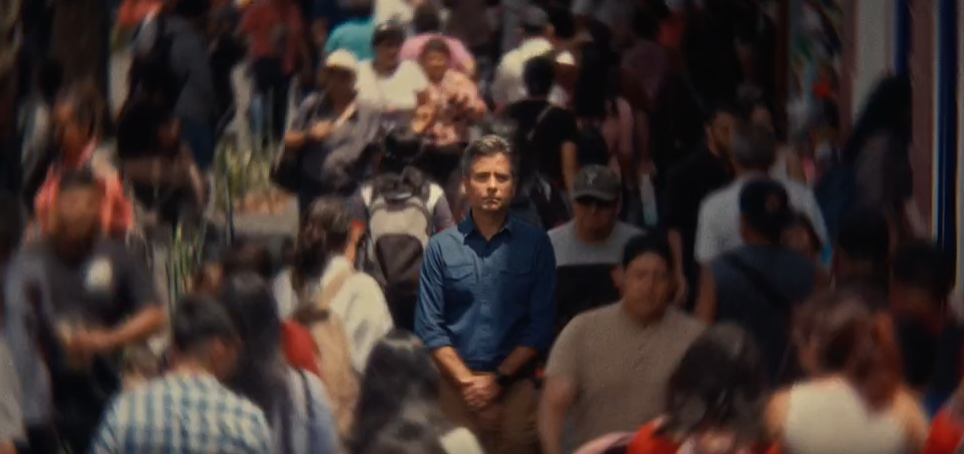 edgar standing in a crowd